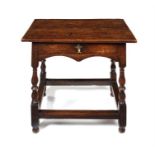 A George II walnut single-drawer side table