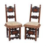 A pair of Italian oak and marquetry high-back chairs, late 19th century