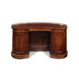 A Victorian rosewood kidney-shaped desk attributed to Gillows