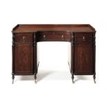 A George IV mahogany inverted bowfront dressing table by Gillows of Lancaster