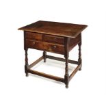 A George II oak three-drawer lowboy