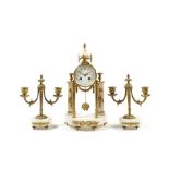 A late 19th century French Louis XV style white marble and gilt bronze clock garniture