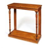 A Regency satinwood and ebonised console table