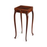 A George III carved mahogany urn stand