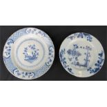 Two 18th century blue and white Delft plate, one Chinese depicting flowers, the other with a