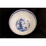 A Japanese bowl made for the Chinese market, early 20th century blue and white with figure to the