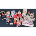 A collection of dolls from around the world including Bulgarian, Maltese etc.