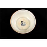 A Chinese provincial celadon bowl, 15cm diameter.