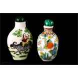 Two polychrome Chinese scent/snuff bottles, 7cm high.