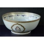 A large Chinese bowl painted with an armorial crest to both sides, possibly 18th century, 28cm