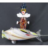 A Murano glass fish and glass clown.