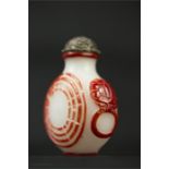 A Chinese scent bottle, red overlay on white.