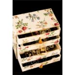 A set of papered drawers containing pairs of earrings, of various style and form, together with