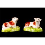 A pair of 19th century Staffordshire cows, 8cm long and a 19th century Staffordshire spill holder,