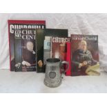 A quantity of books relating to Churchill including a tankard.