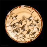 A Chinese porcelain plate, decorated with Quail and gilded highlights circa 1920.