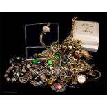 A group of costume jewellery to include beaded necklaces, trinket box, pendant necklaces, an 18ct