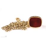 A gold Carnelian fob and chain, marked 9ct to chain, 15.8g.