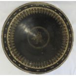 A papier mache Indian bowl inlaid with decoration.