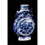 A small Chinese blue and white moon flask, modelled at the collars, 12cm high