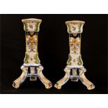 A pair of Italian majolica style candlesticks.