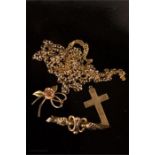 A group of 9ct gold including pendant cross, brooch, necklaces and brooch.