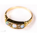 An 18ct gold and three stone opal ring, size O, 2.8g.