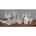 A group of cut glass crystal, including champagne