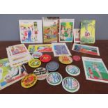 A group of retro badges and 1960s 'naughty' postca