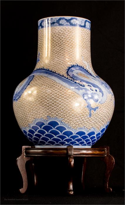 A fine Japanese vase, with ovoid body, depicting scales