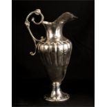 A continental silver on copper ewer.