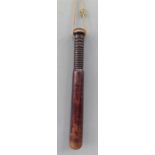 A treen truncheon, with turned handle.