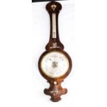 A 19th century wheel barometer inlaid with mother