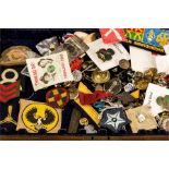 A box of military badges and buttons, girl guides