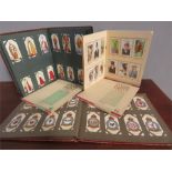 A quantity of cigarette cards , loose and in album