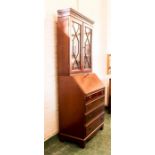 A mahogany glazed bureau bookcase.