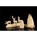 A group of three 20th century bone carvings, North
