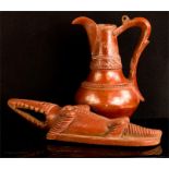 An Egyptian red clay 'of the Nile' ewer, with impr