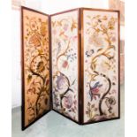 A fine crewel work three fold screen, late 19th/early 20th century.