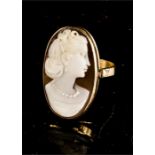 A yellow metal oval cameo ring, size N, 3.6g total