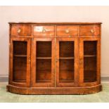 A 19th century bow front mahogany cabinet with wir