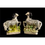 A pair of 19th century Staffordshire Zebras, circa