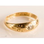 An 18ct gold and diamond ring , size J, 2.4g.