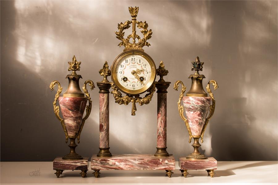 A French clock garniture by L'Esperance Henri Godc