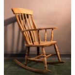 A pine rocking chair.