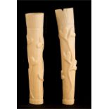 A 19th century pair of ivory holders.