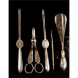 A group of silver and other implements and a silve