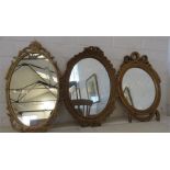 Three gilt composition oval mirrors of differing s