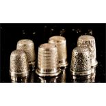 A group of silver thimbles; three by Sampson Morde