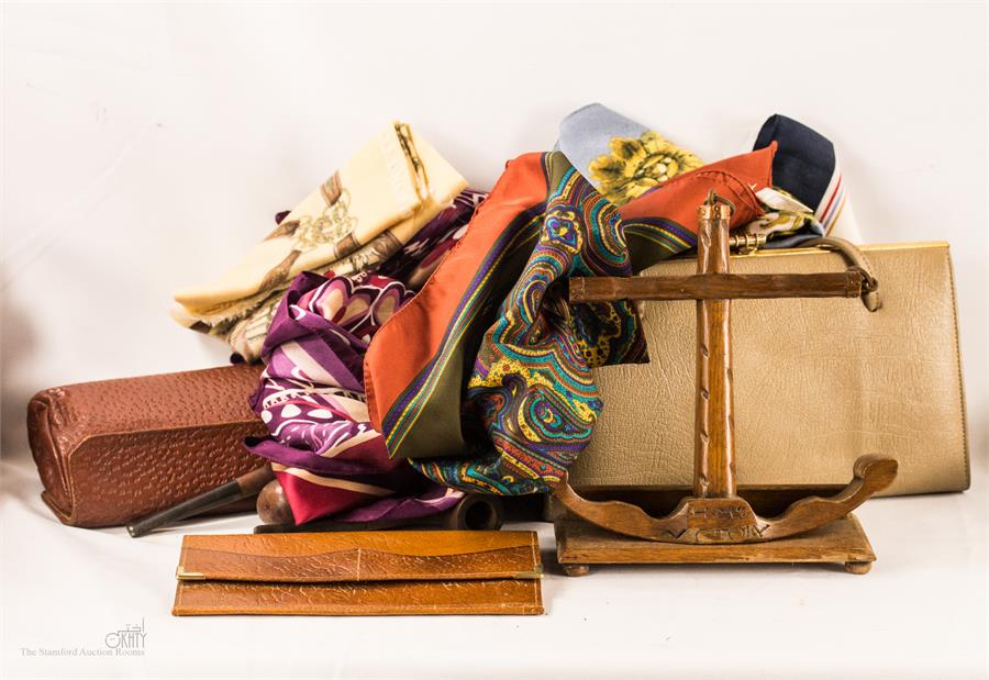 A group of vintage bags and scarves.